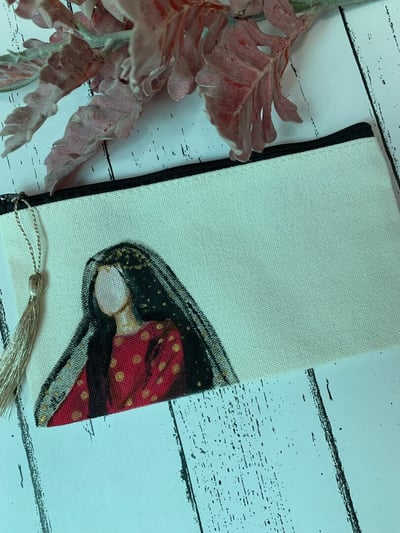 صورة محفظة قماشية بزي شعبي