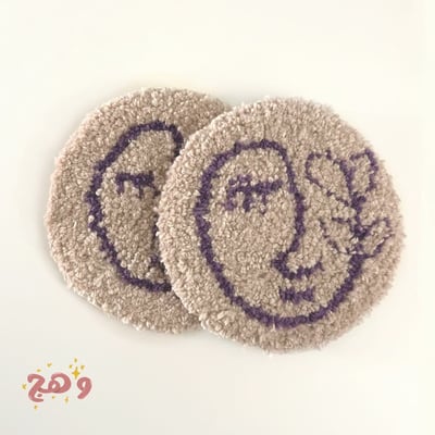 صورة قاعدة كوب بتصميم سيريالي coaster punch needle
