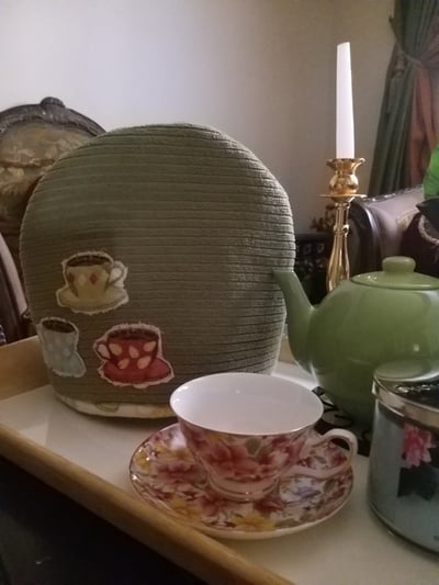 صورة Tea cozyغطاء ابريق مزين بصور