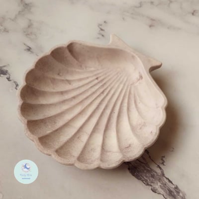 صورة كوستر الصدفة 🐚🌊 تموجات البنفسجي 