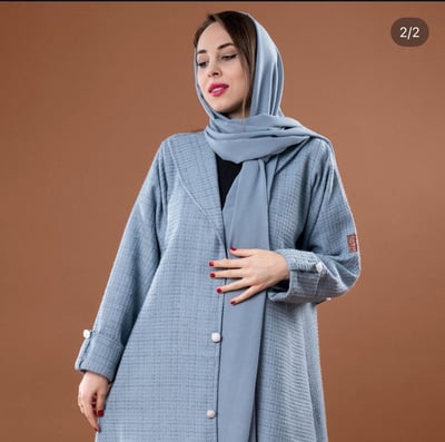 صورة عبايه سماوى شتوى شانيل مع طرحه ساده سماوى